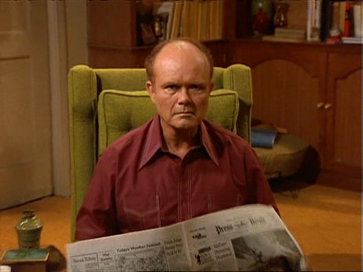 Red Forman Red Forman reading a news paper