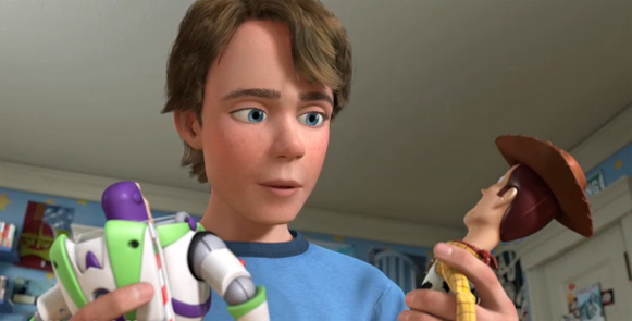 Andy holding Buzz Lightyear and Woody in Toy Story 3