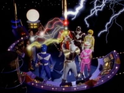 Tommy transferring the power of Red, Yellow, and Black rangers to Rocky, Adam, and Aisha